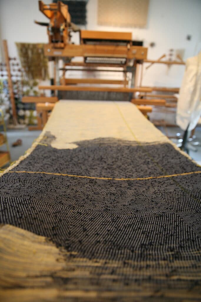 weaving on the loom