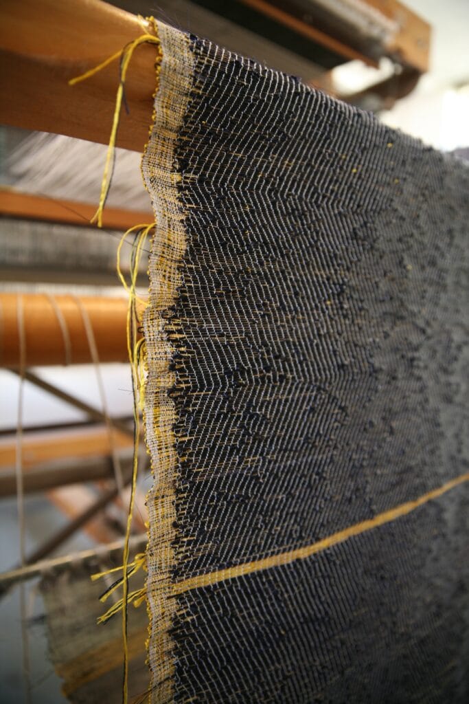 weaving hanging on loom