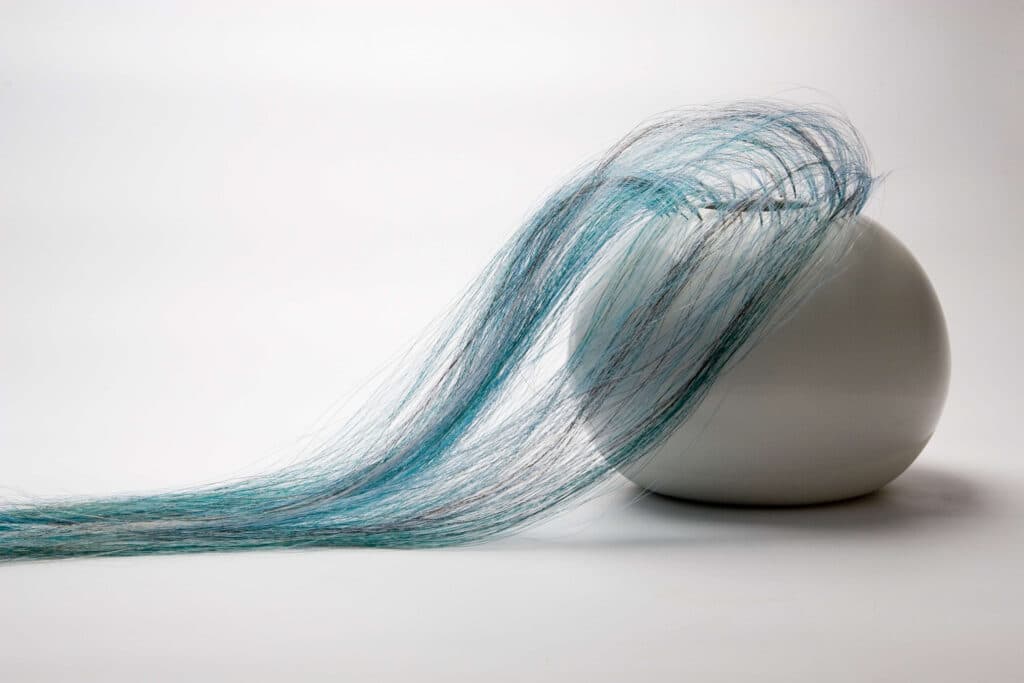horsehair flowing from porcelain ball