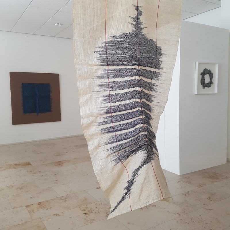 handwoven hanging in galery space