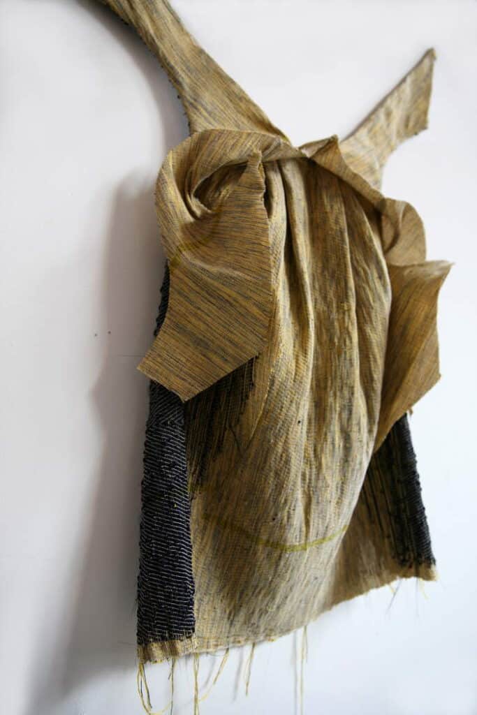 backside dress on white wall