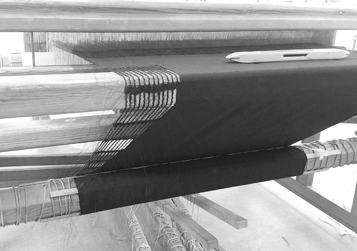 handwoven fabric on loom