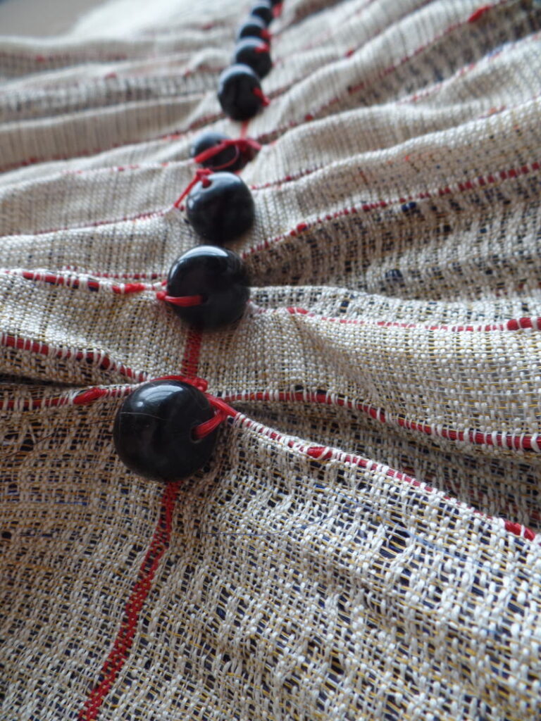 round balls woven in fabric