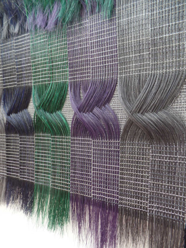 close up weaving purple grey green