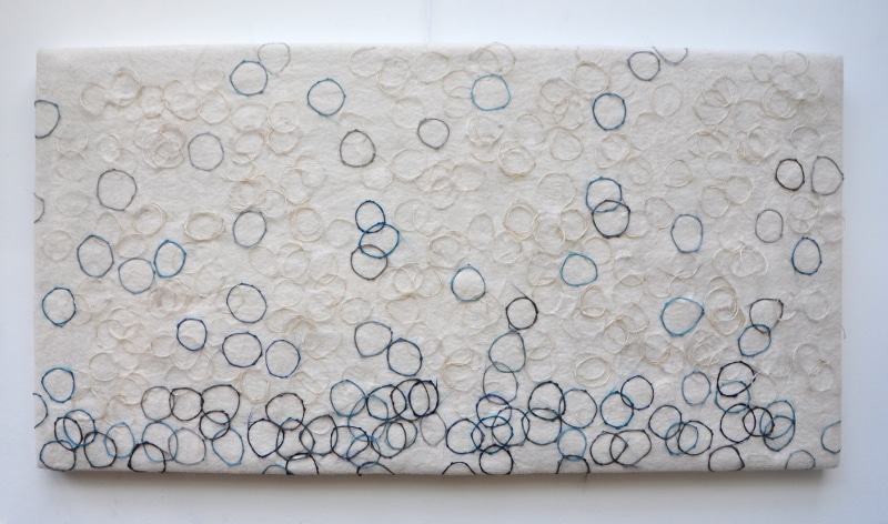 wall panel white wool blue circles